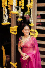 Sargun Aangi by Sargun Mehta in pure georgette featuring handmade Bandhani artistry and scattered Gota flowers by House of Baisa