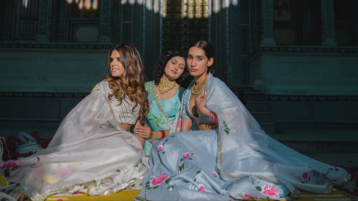 Women in hand-worked Gota Patti Aangi blouses and organza sarees by House of Baisa