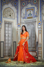 House of Baisa orange lehenga worn by model for wedding event


