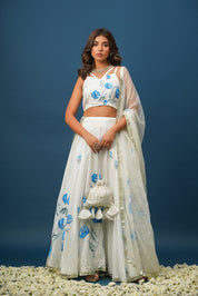 White Orchid Blue Lehenga Set – Elegant Floral Satin for Weddings & Celebrations