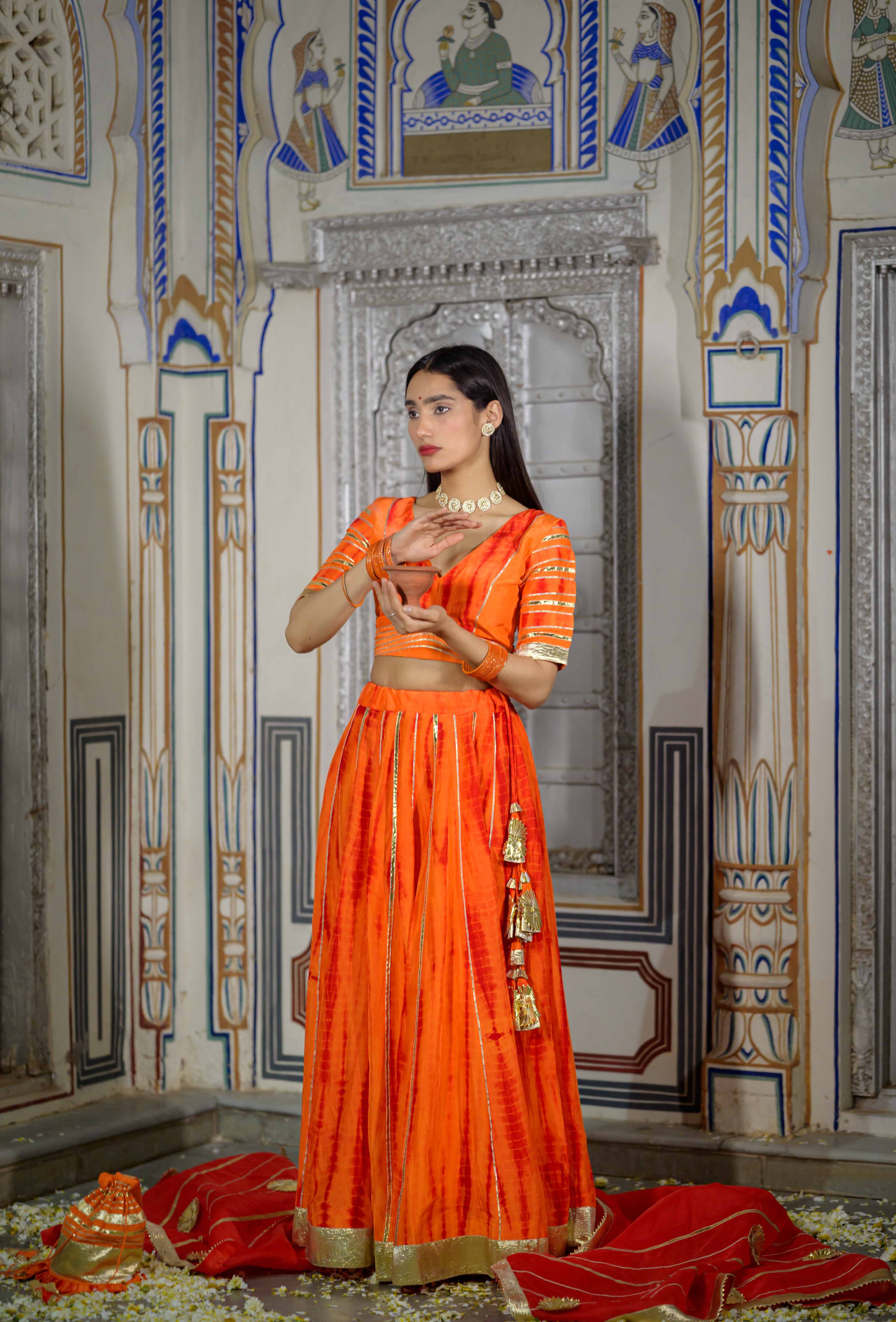 Traditional orange lehenga with gota work – House of Baisa

