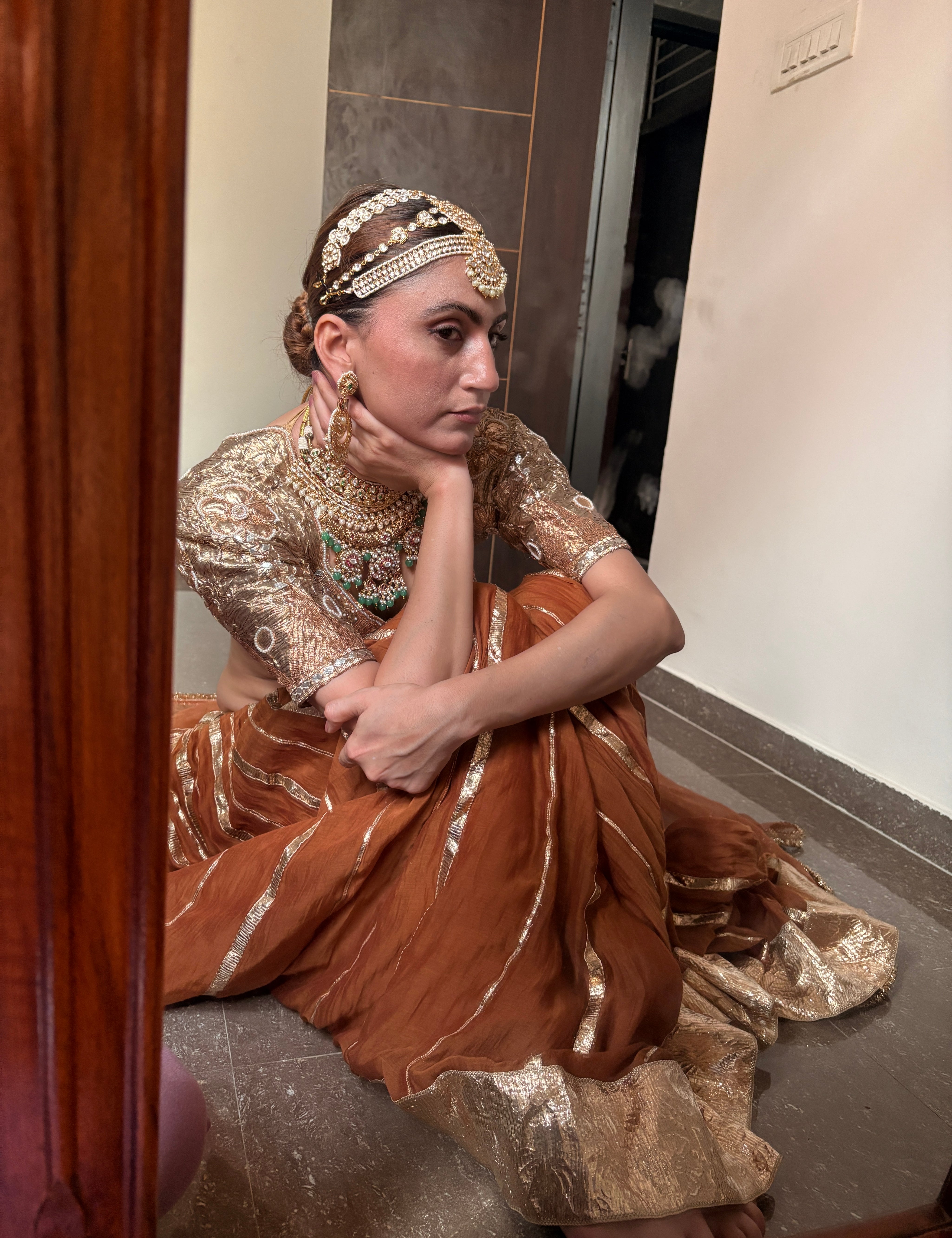 Bhuri brown Jaipuri lehenga set in pure mul Chanderi with copper Gota Aangi and organza dupatta