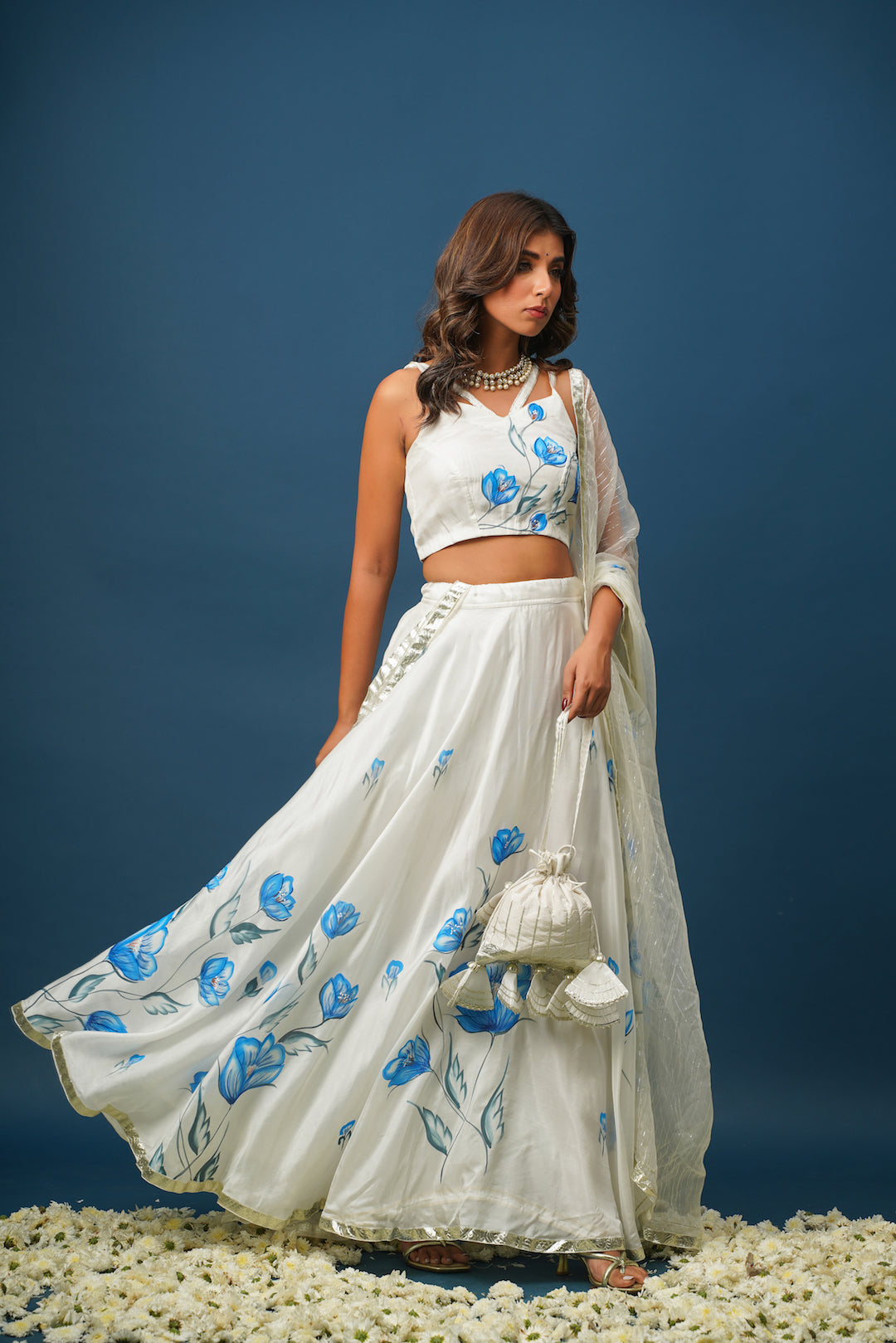 Festive styling with pastel blue lehenga outfit

