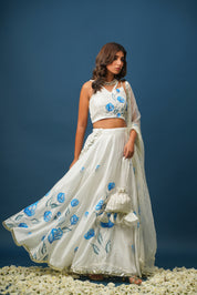 Festive styling with pastel blue lehenga outfit
