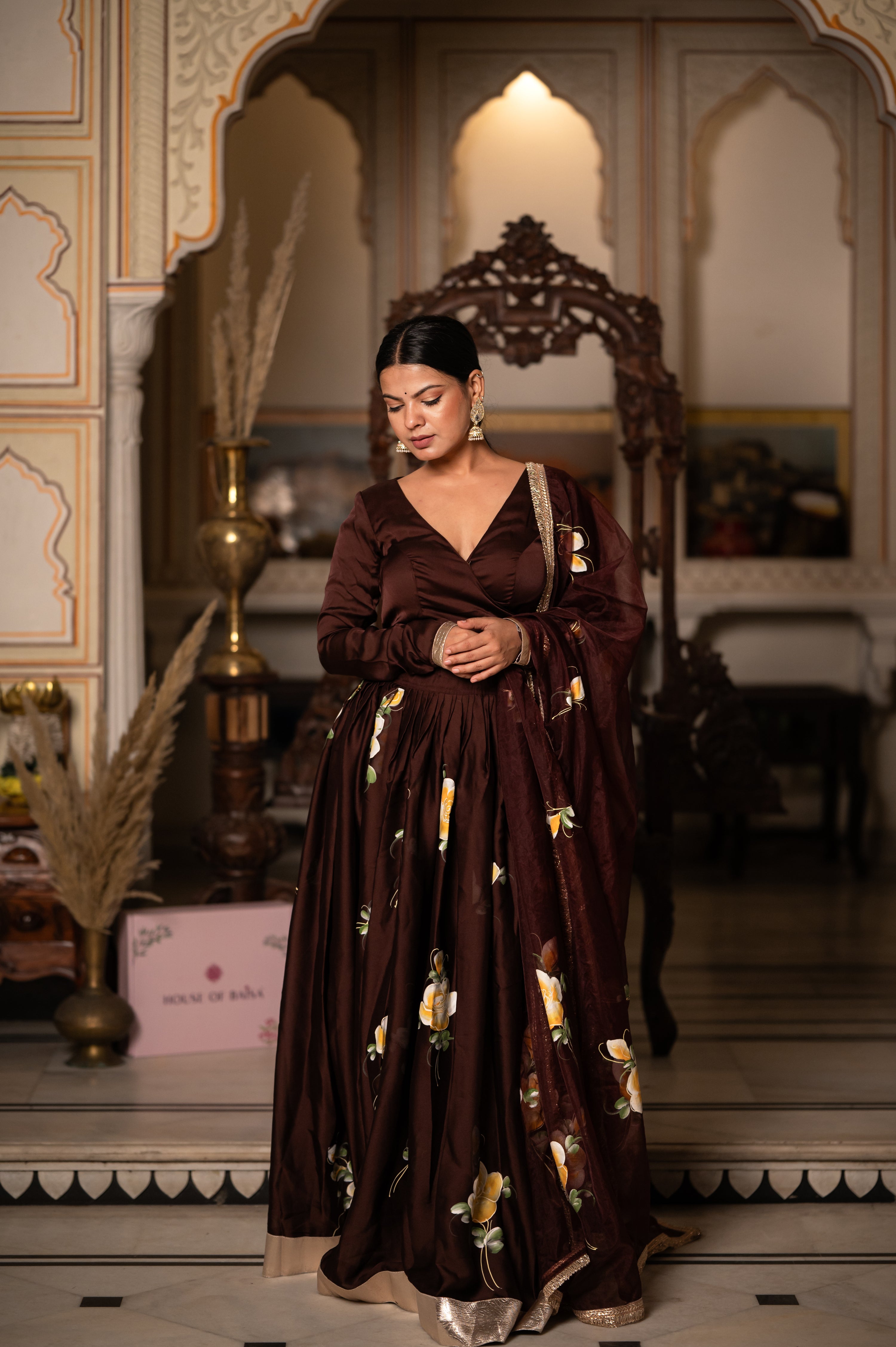 Model wearing brown lehenga for wedding and festive occasions