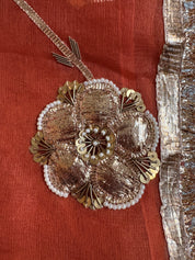 Close-up of hand-cut Gota flowers with pearls and Dabka on the Chameli organza saree