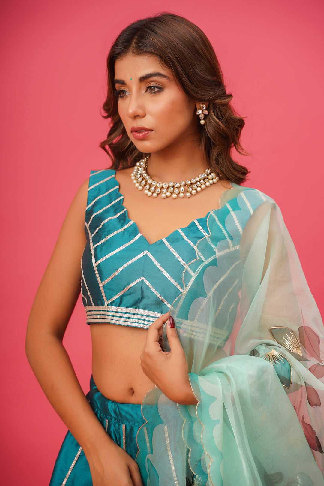 dupatta drape of teal lehenga	