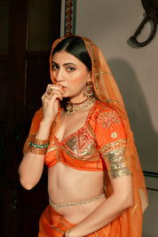 Lotus Aangi Saree Set featuring an orange organza silk saree and Gota embroidered blouse