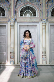 Model wearing pastel marble satin lehenga with organza dupatta 