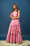 Bridesmaid outfit idea in pastel pink lehenga with subtle gota work

