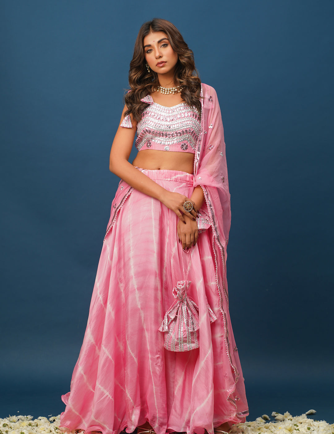 Full lehenga set with blouse, skirt, and net dupatta
