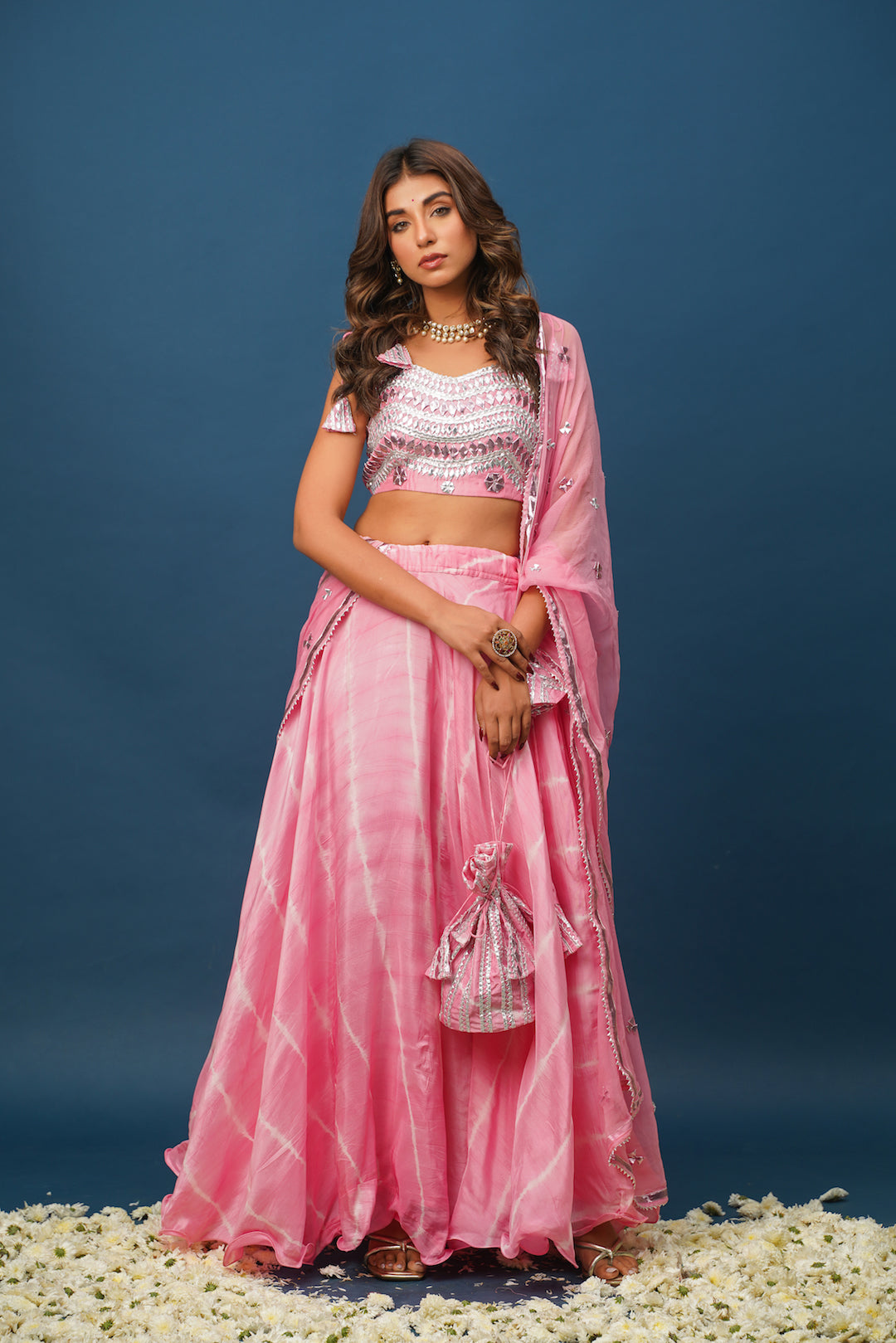 Full lehenga set with blouse, skirt, and net dupatta

