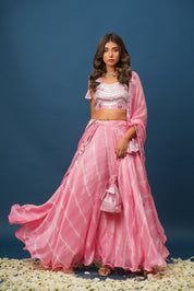 Woman in pink satin lehenga with khara gota embroidery
