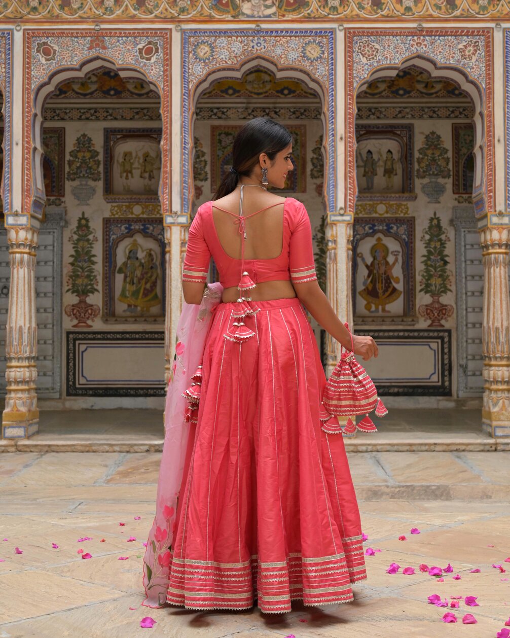 Flatlay view of lehenga showing blouse and skirt