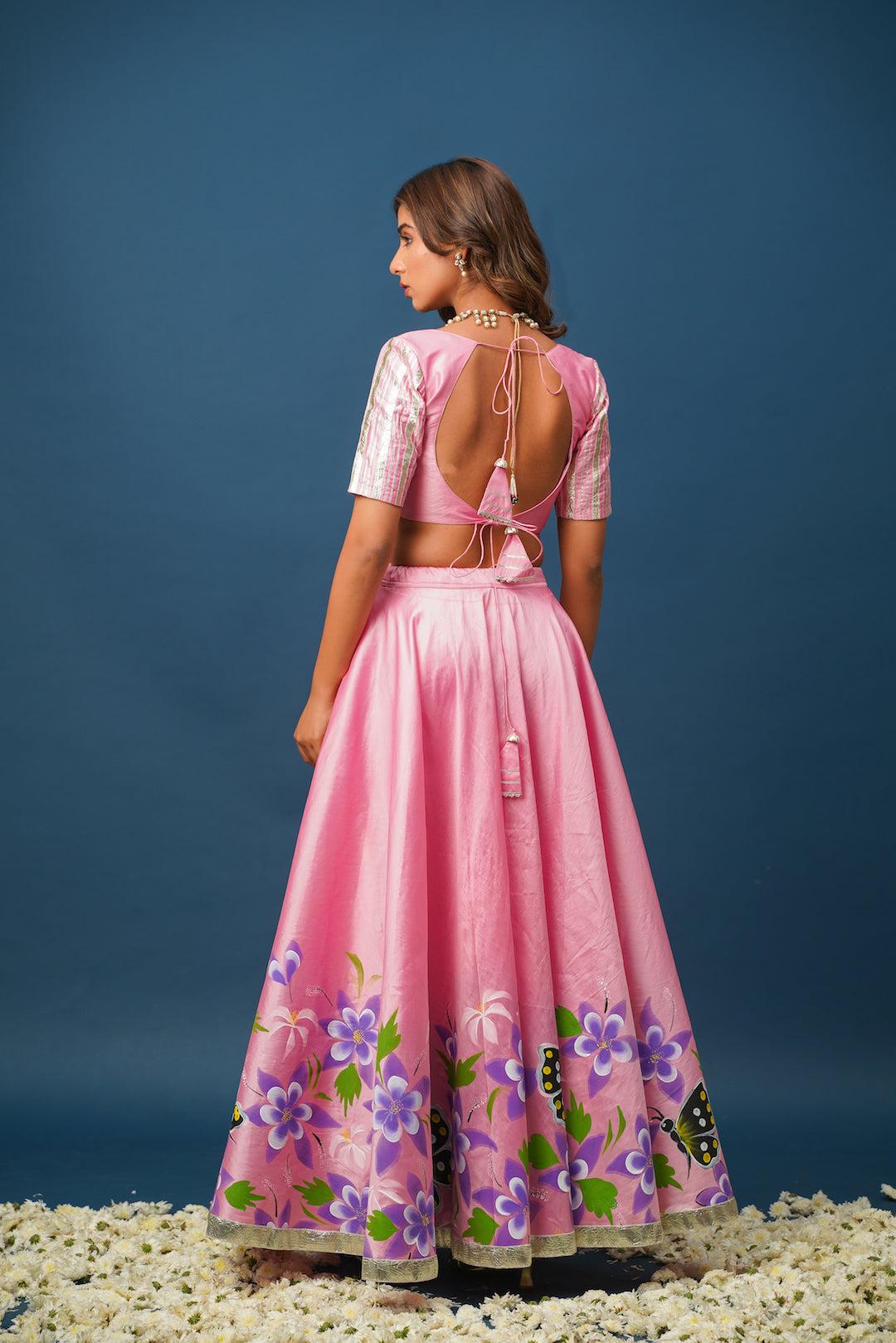 Pink lehenga styled for mehendi or haldi ceremony
