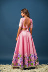 Pink lehenga styled for mehendi or haldi ceremony
