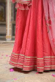 Model styling pink lehenga for a sangeet function