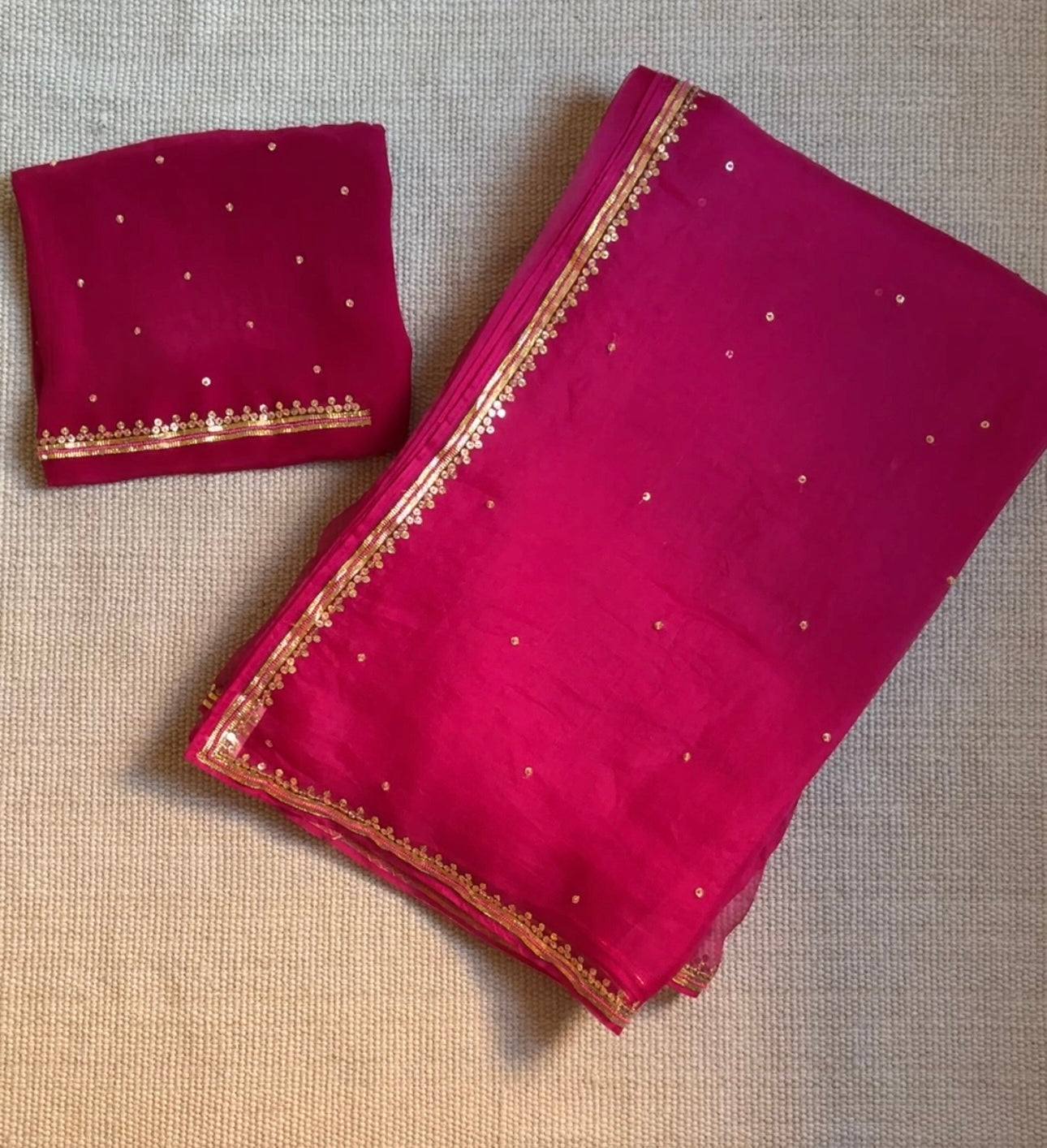 Close-up of copper Gota, beads and sequins on the Sargun organza saree border