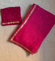 Close-up of copper Gota, beads and sequins on the Sargun organza saree border