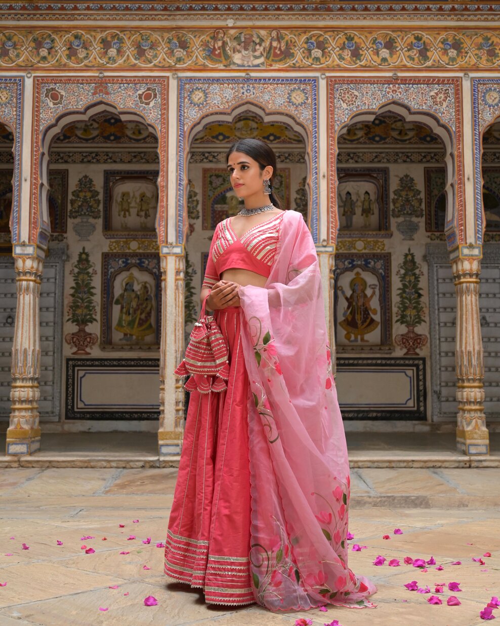 Pink lehenga styled for wedding or festive ceremony