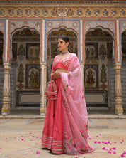 Pink lehenga styled for wedding or festive ceremony