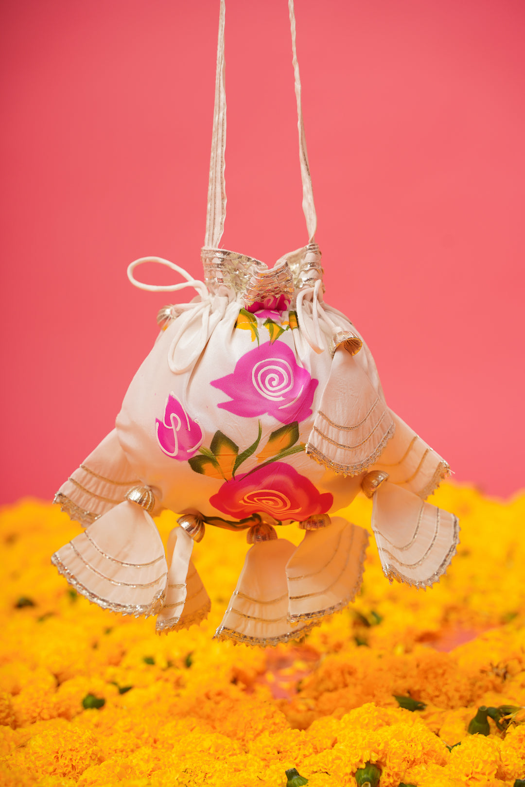 White lehenga set styled with matching dupatta, accessories, and pastel makeup for a soft bridal look
